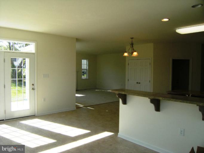 783 Rivanna Run Falling Waters, WV 25419 - Photo 5 of 30 a view of a livingroom with a bathroom