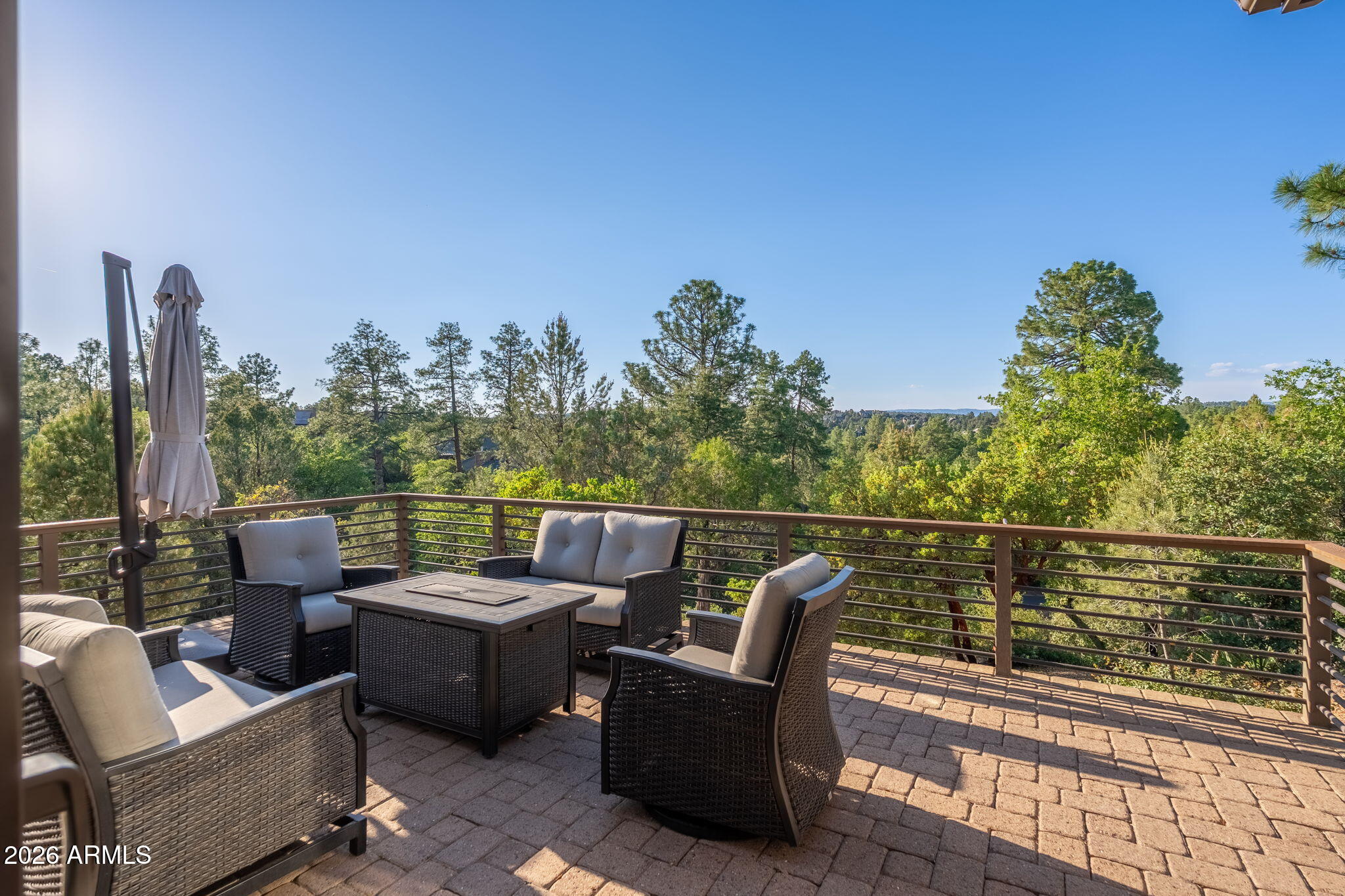 2208 East Filaree Circle Payson, AZ 85541 - Photo 32 of 60 a view of a roof deck with couches and potted plants