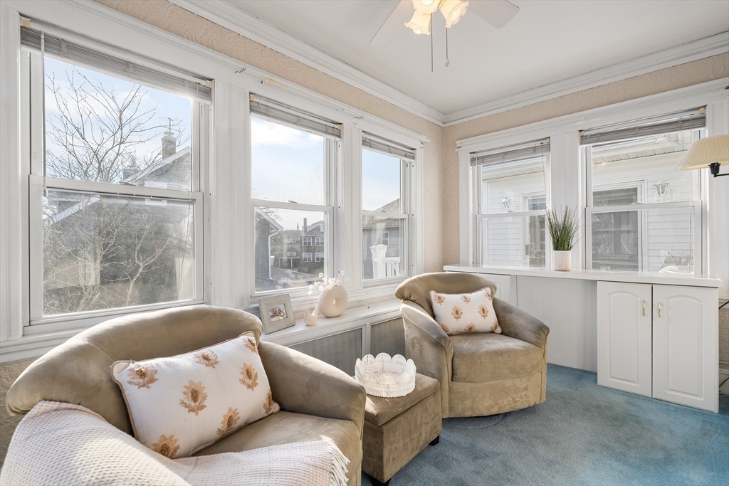 26-28 Alton Street Arlington, MA 02474 - Photo 14 of 41 a living room with furniture and a large window