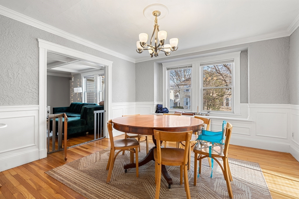 26-28 Alton Street Arlington, MA 02474 - Photo 27 of 41 a view of a dining room with furniture window and wooden floor
