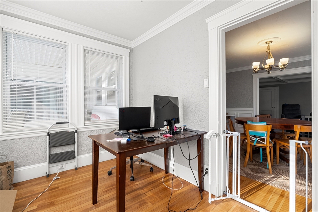 26-28 Alton Street Arlington, MA 02474 - Photo 34 of 41 a view of a workspace with furniture and a window