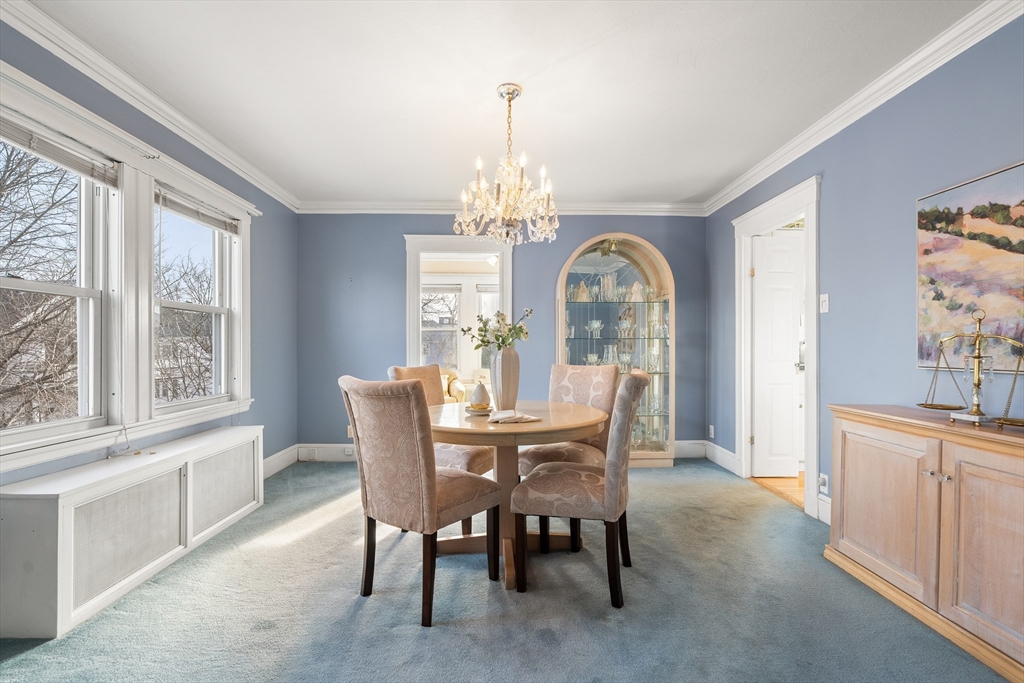 26-28 Alton Street Arlington, MA 02474 - Photo 6 of 41 a view of a dining room with furniture window and outside view