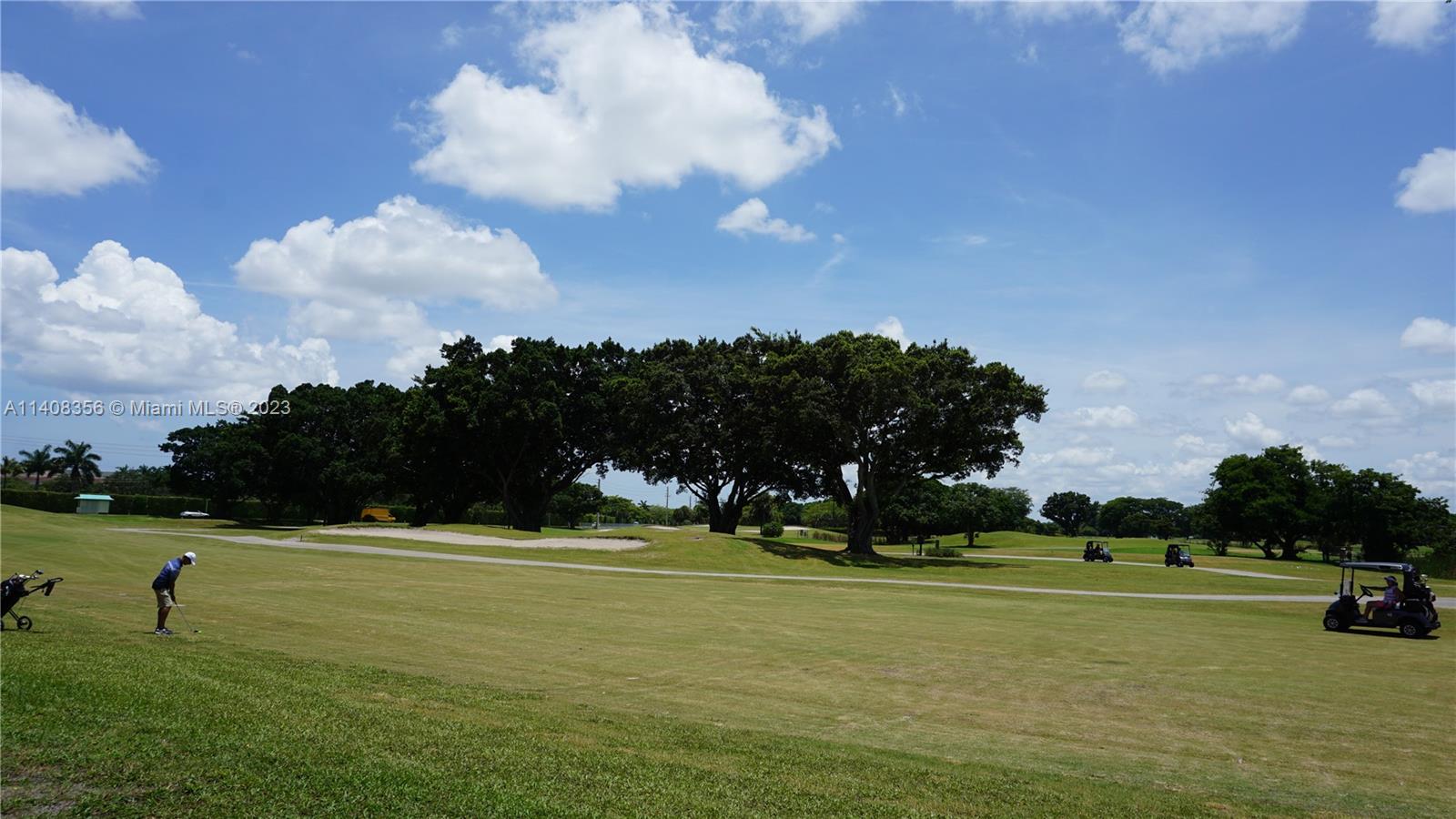 9099 Gettysburg Road Boca Raton, FL 33434 - Photo 24 of 25 a view of building with outdoor space