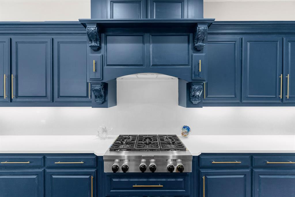 2257 Hermitage Drive Allen, TX 75013 - Photo 15 of 40 a stove top oven sitting inside of a kitchen