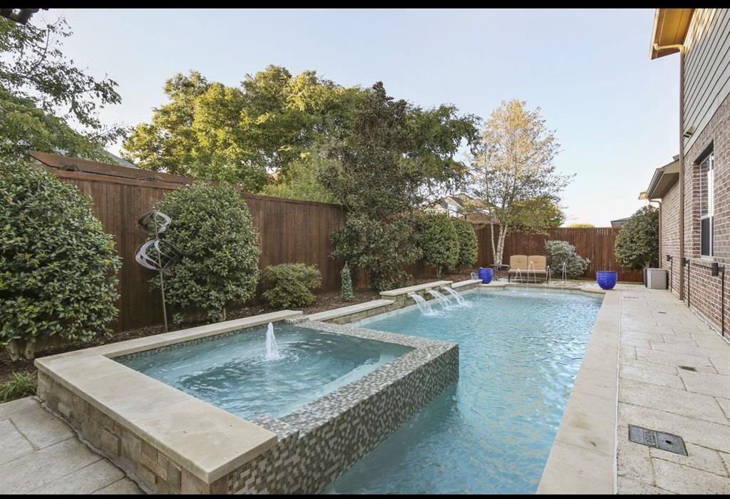 2257 Hermitage Drive Allen, TX 75013 - Photo 2 of 40 a view of a yard with cars