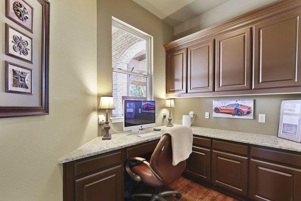 2257 Hermitage Drive Allen, TX 75013 - Photo 30 of 40 a kitchen with a sink cabinets and wooden floor