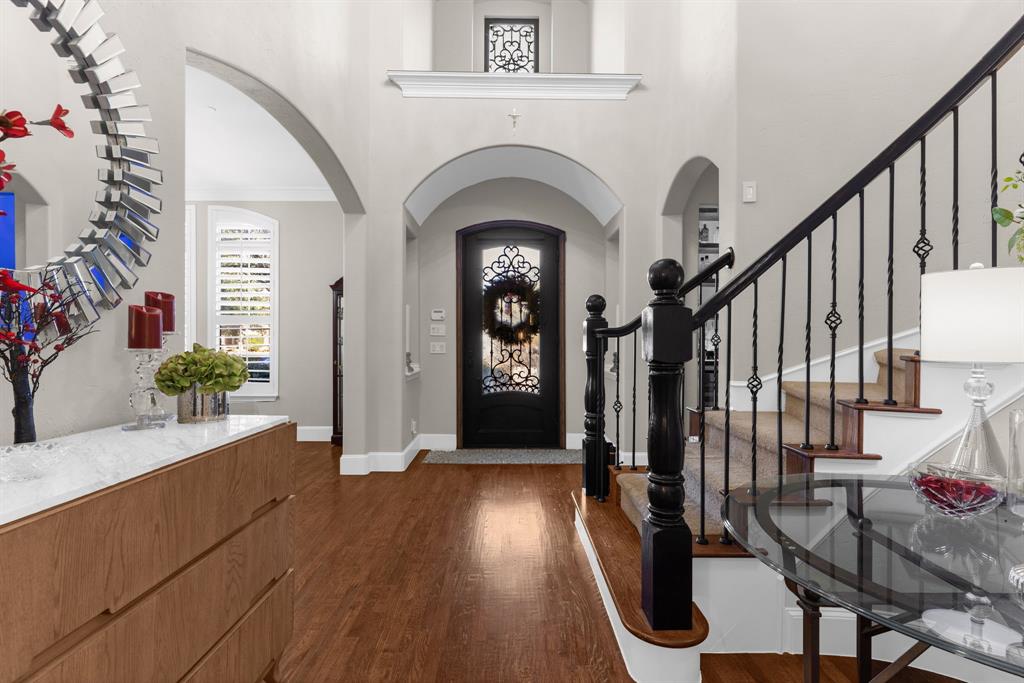 2257 Hermitage Drive Allen, TX 75013 - Photo 7 of 40 a view of an entryway with wooden floor