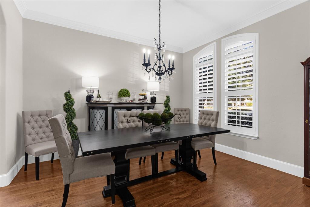 2257 Hermitage Drive Allen, TX 75013 - Photo 8 of 40 a view of a dining room with furniture window and wooden floor