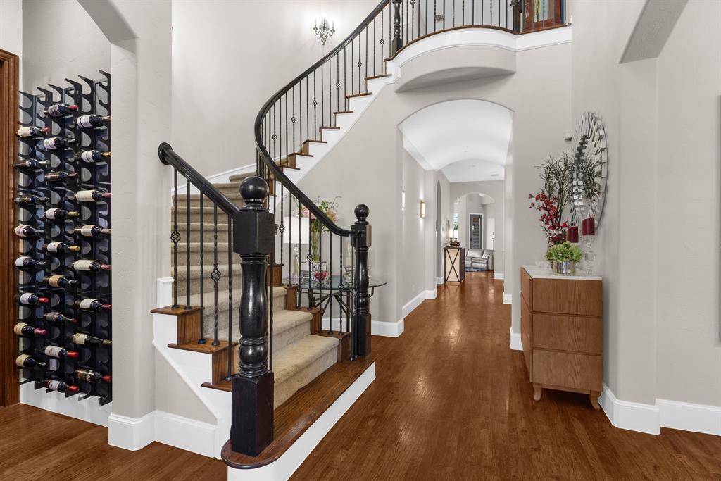 2257 Hermitage Drive Allen, TX 75013 - Photo 9 of 40 a view of entryway and hall with wooden floor