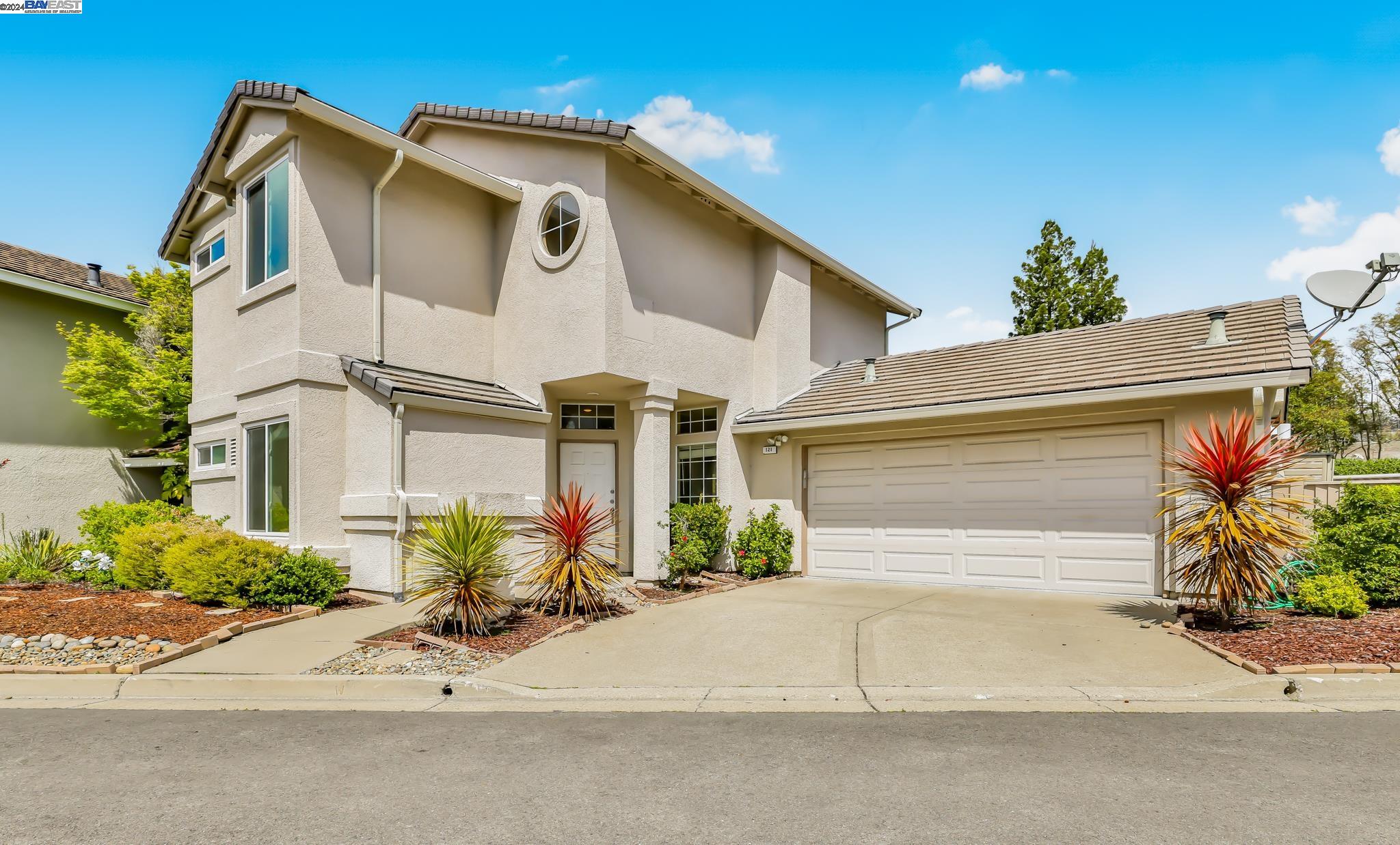 121 Lakeridge Lane San Ramon, CA 94582 - Photo 1 of 1 a front view of a house with a yard and a garage