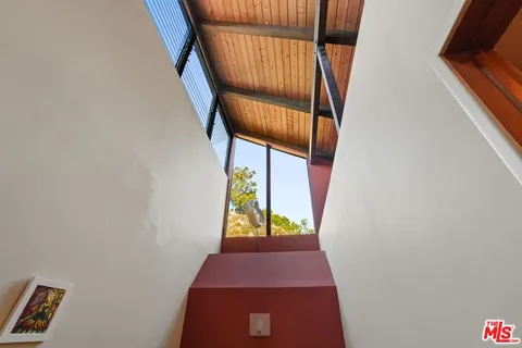 a view of balcony with furniture
