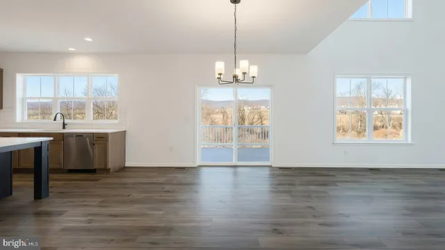 a view of kitchen and windows