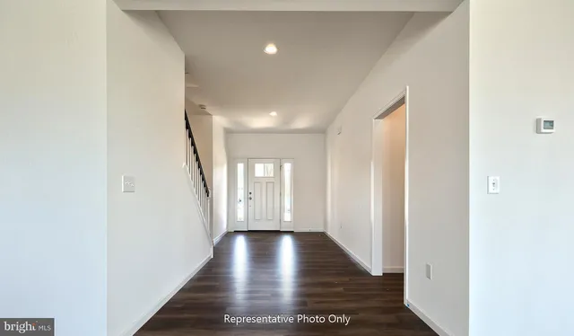 a view of gallery with wooden floor