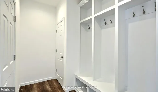 a bathroom with a sink and shower