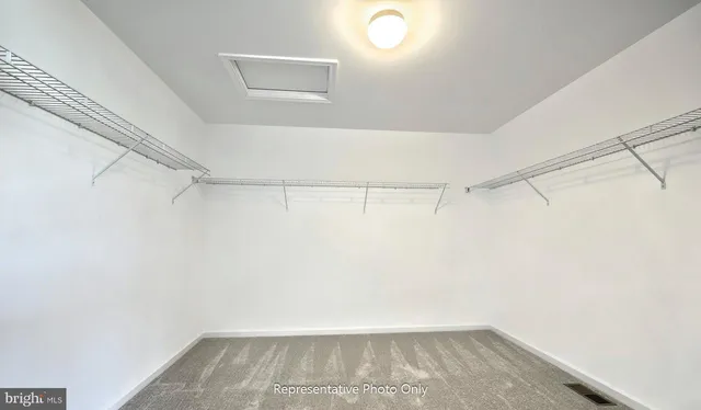 a view of a room with racks on the wall