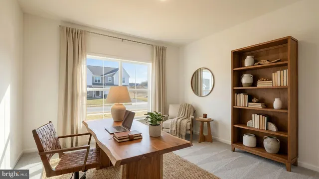 a workspace with furniture and a window