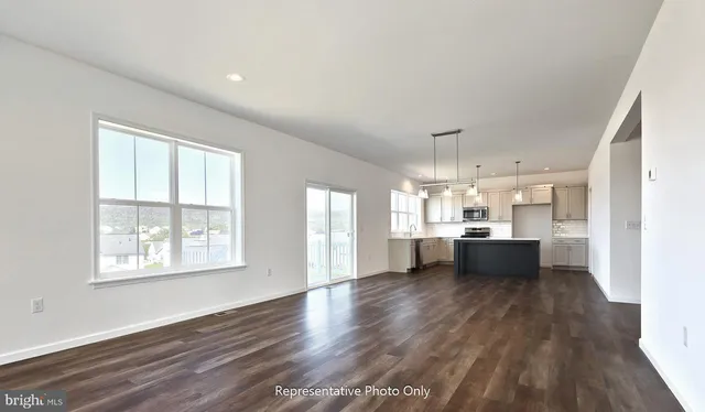 a view of kitchen and windows