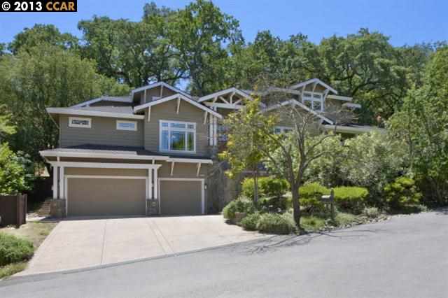 3407 Shangri La Road Lafayette, CA 94549 - Photo 1 of 1 a front view of a house with a yard and garage