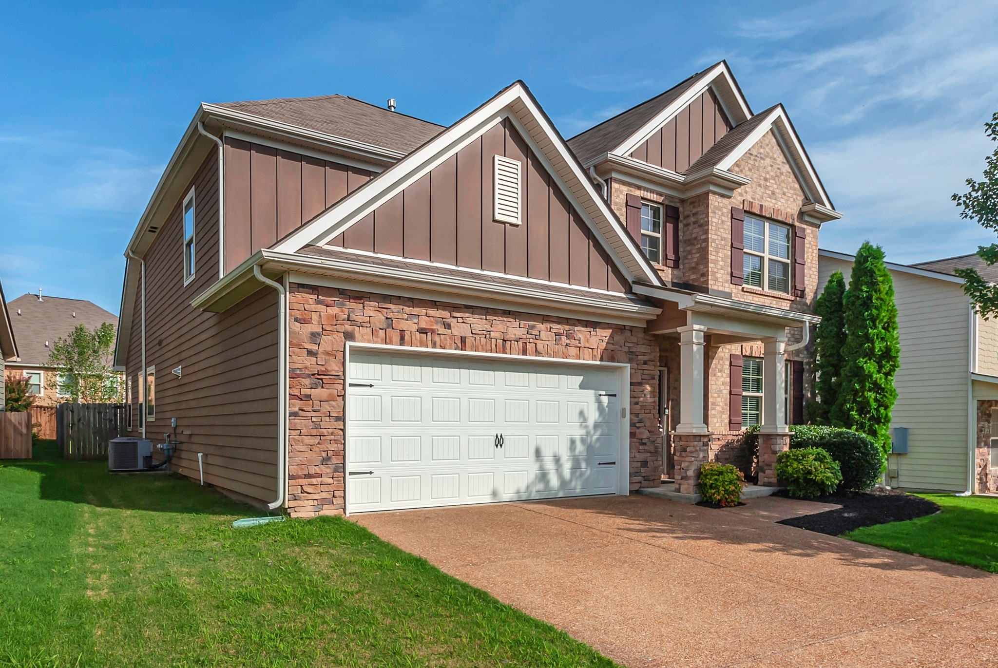 3005 Alan Drive Spring Hill, TN 37174 - Photo 2 of 41 a front view of a house with a yard and garage