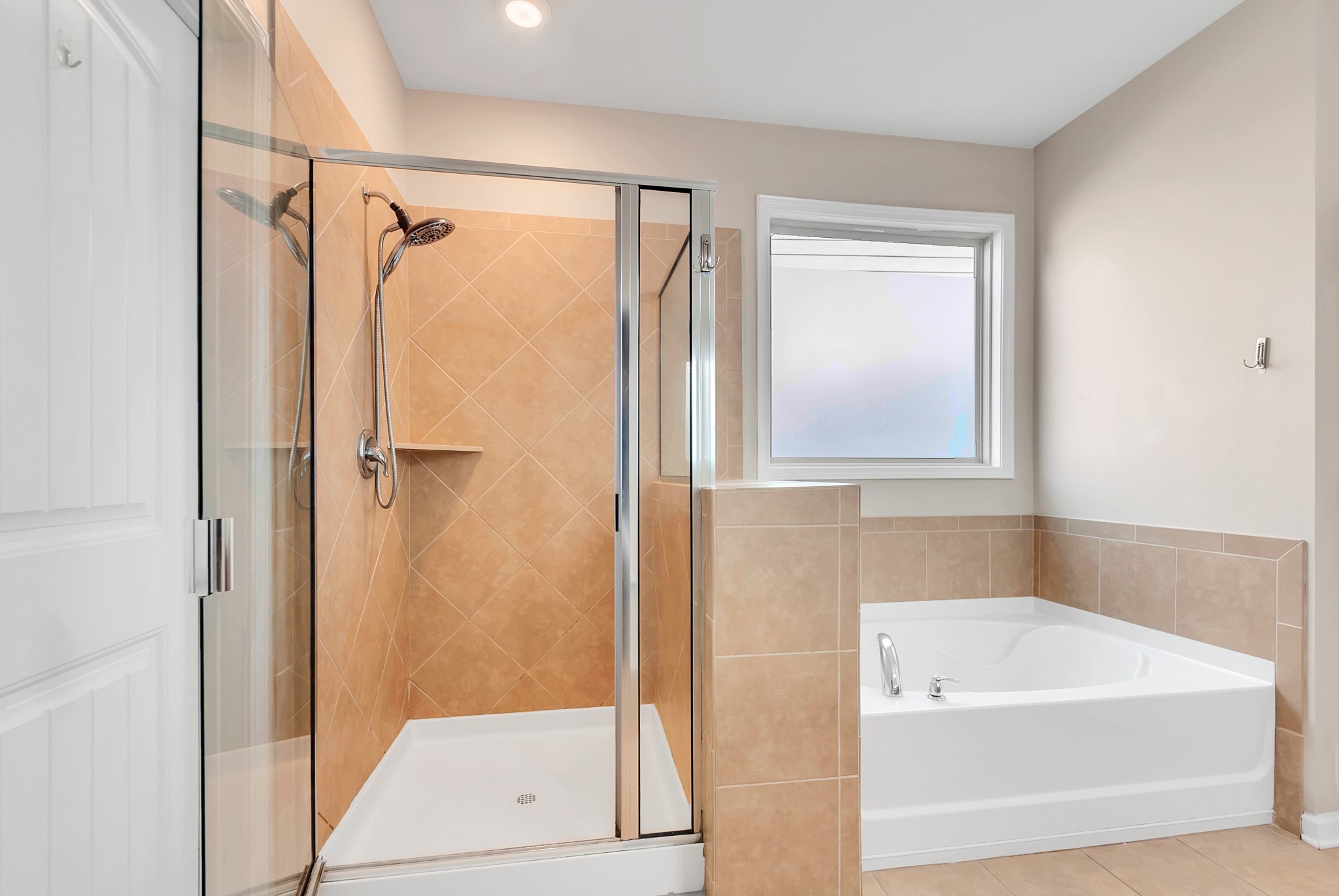 3005 Alan Drive Spring Hill, TN 37174 - Photo 24 of 41 a bathroom with a bathtub and a shower
