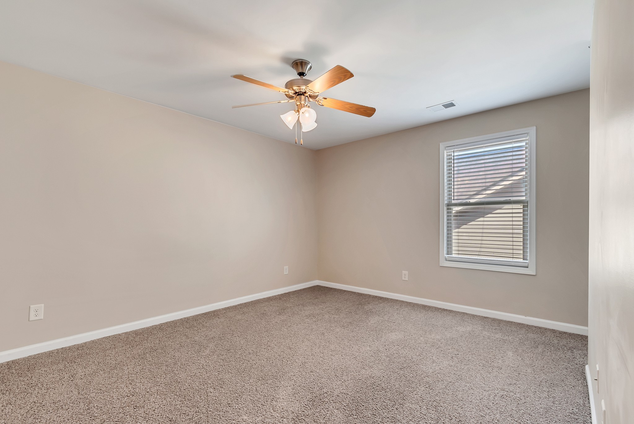 3005 Alan Drive Spring Hill, TN 37174 - Photo 26 of 41 an empty room with windows and fan