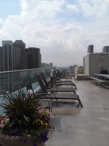 40 East 9th Street, Unit 804 Chicago, IL 60605 - Photo 14 of 16 a view of a terrace with sitting area