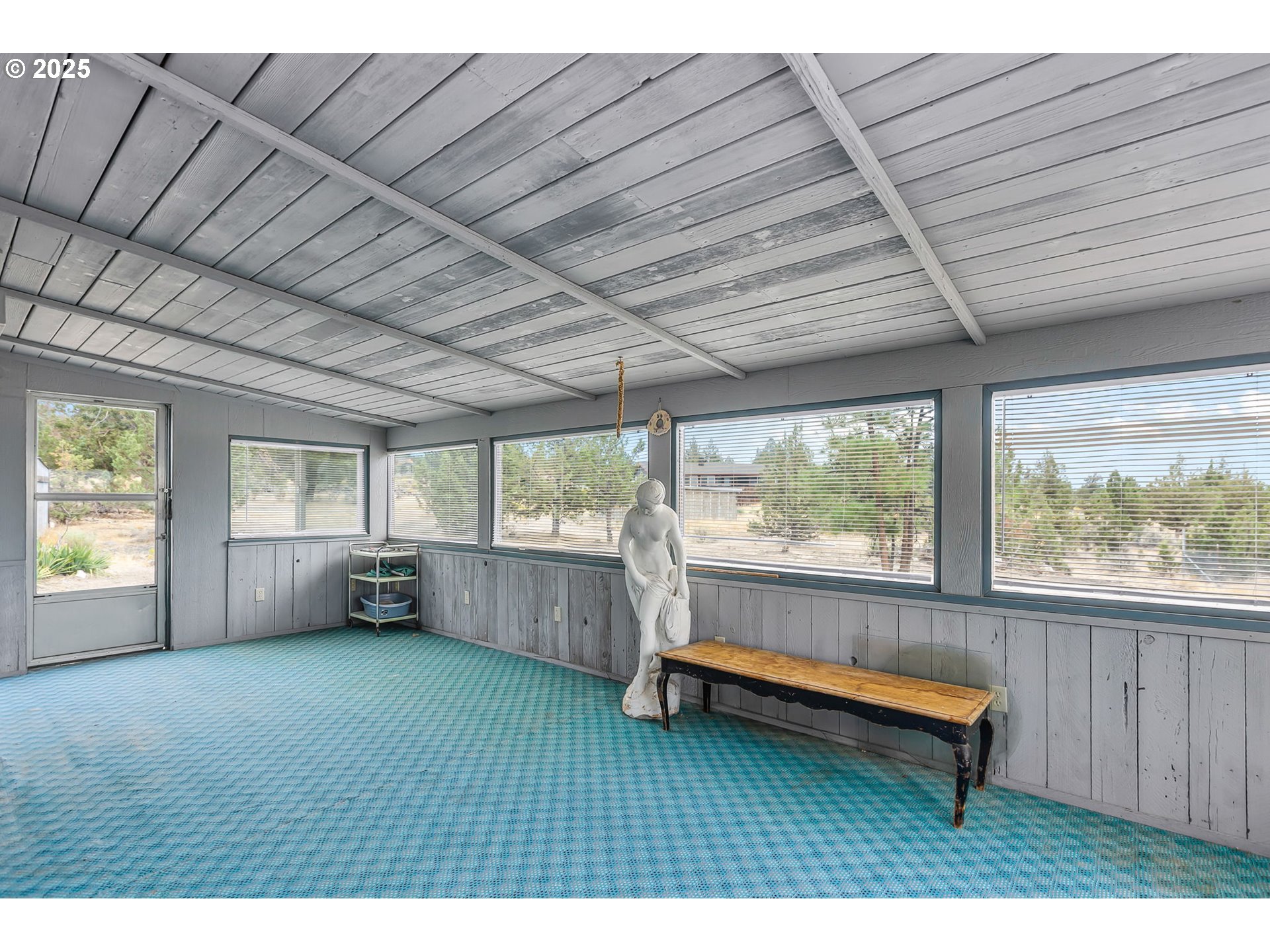 5969 Southwest Sundance Lane Culver, OR 97734 - Photo 17 of 23 a room with furniture and a large window