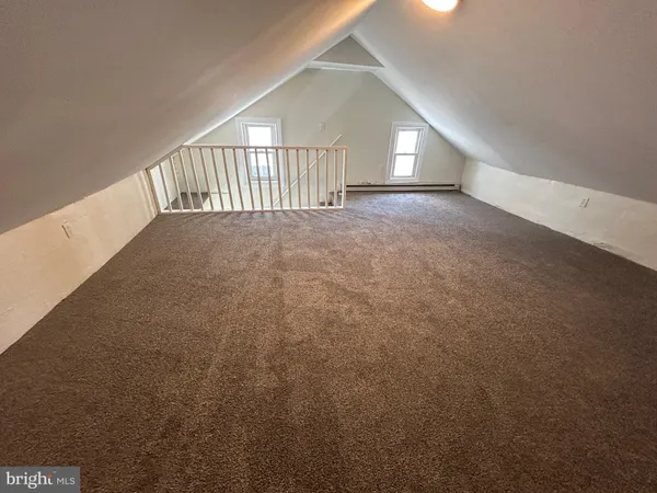 a view of balcony with wooden floor
