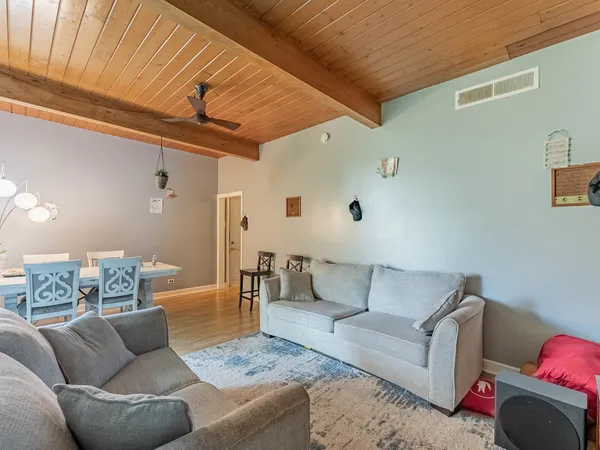 a living room with furniture and a couch