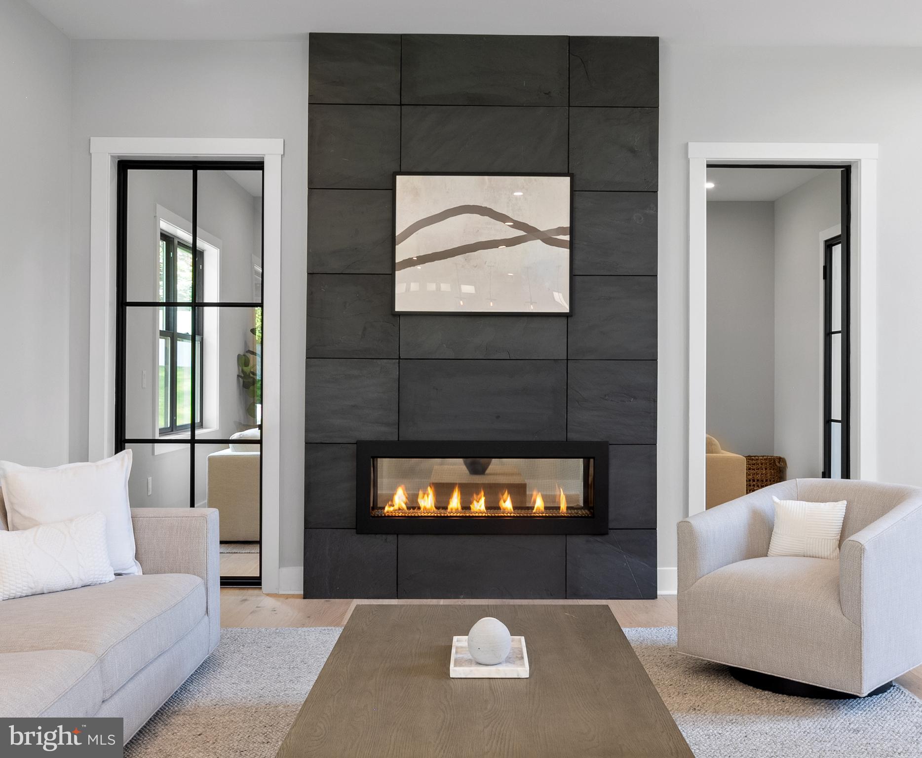 761 Mt Moro Road Villanova, PA 19085 - Photo 15 of 92 Double Sided Glass Fireplace with slate surround