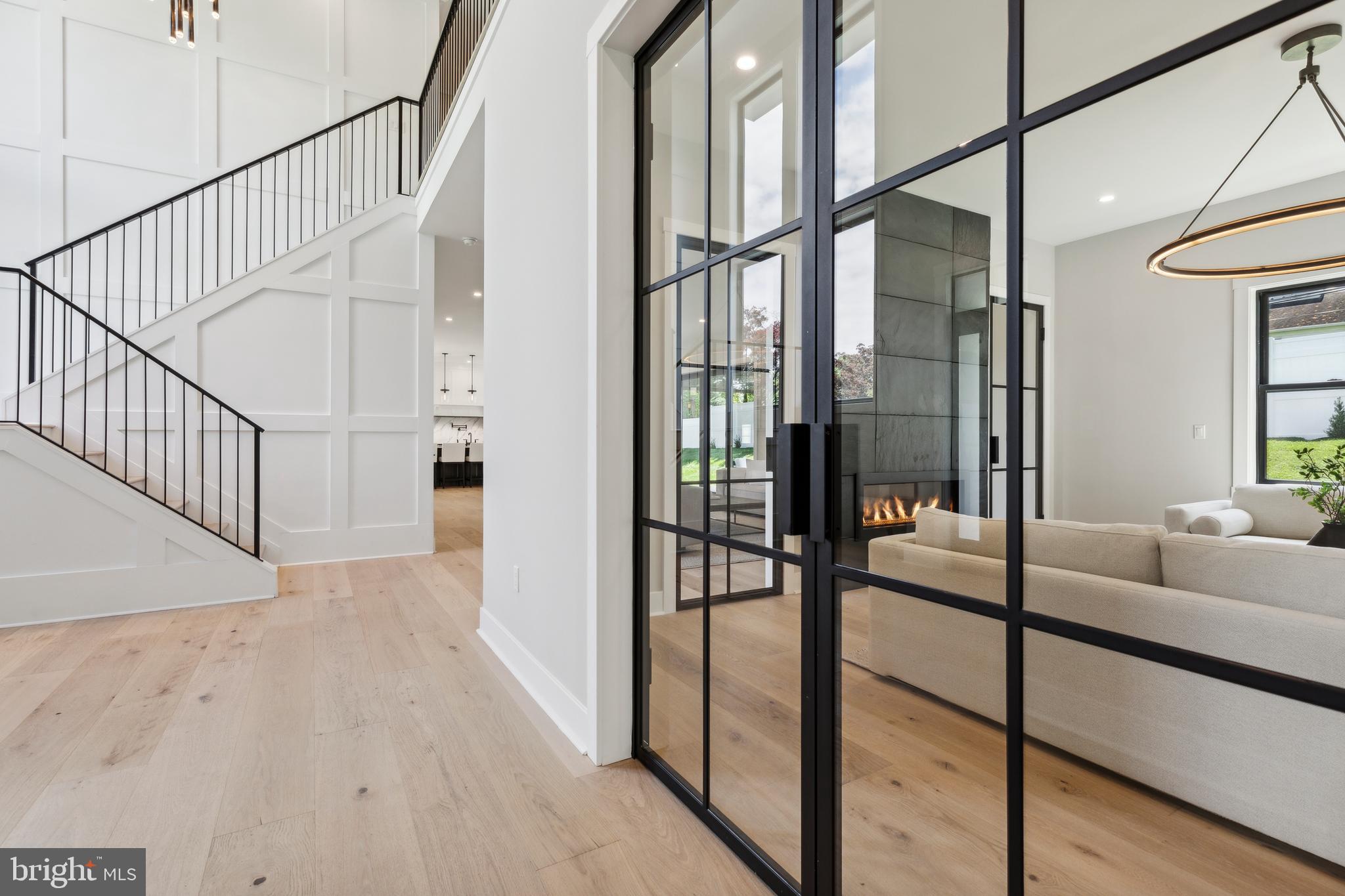 761 Mt Moro Road Villanova, PA 19085 - Photo 44 of 92 a view of staircase with white walls and glass door