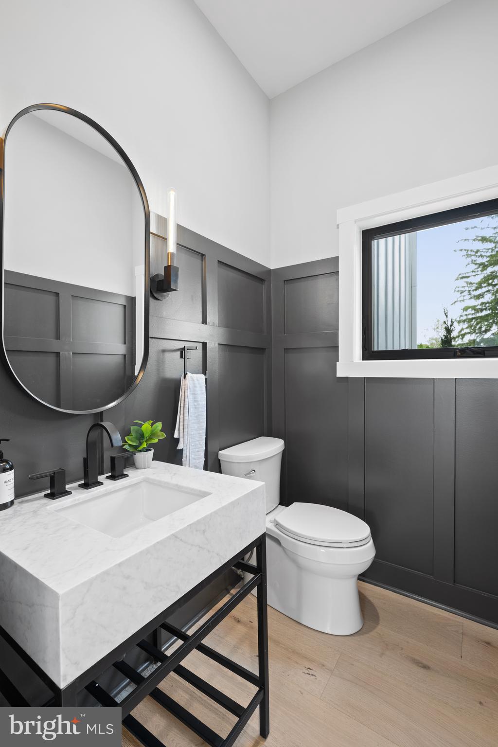 761 Mt Moro Road Villanova, PA 19085 - Photo 49 of 92 a bathroom with a sink toilet and mirror