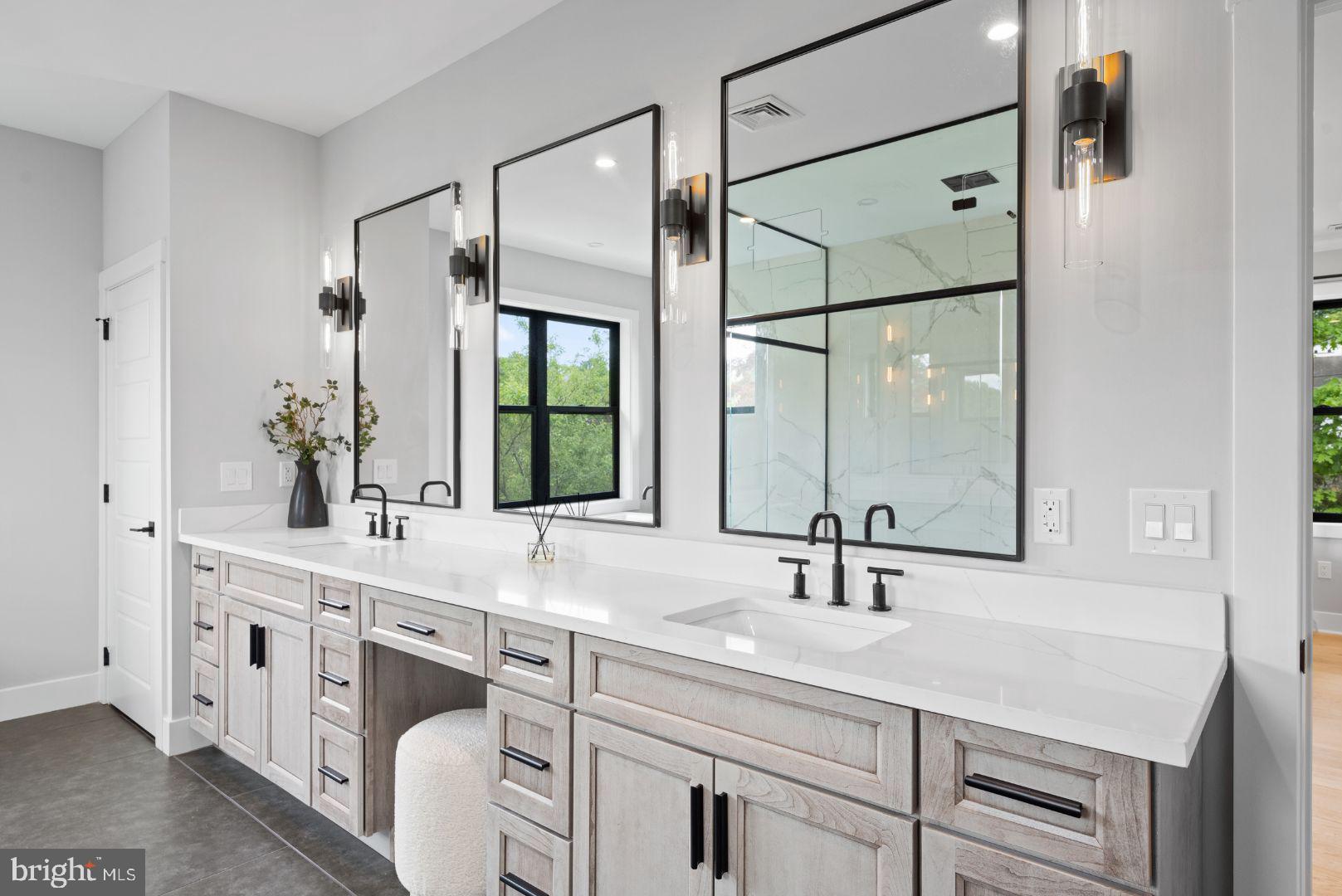 761 Mt Moro Road Villanova, PA 19085 - Photo 65 of 92 a bathroom with a sink and a mirror
