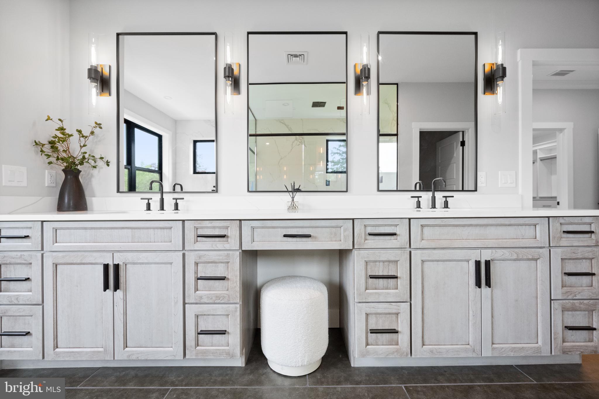761 Mt Moro Road Villanova, PA 19085 - Photo 66 of 92 a bathroom with a sink and a mirror