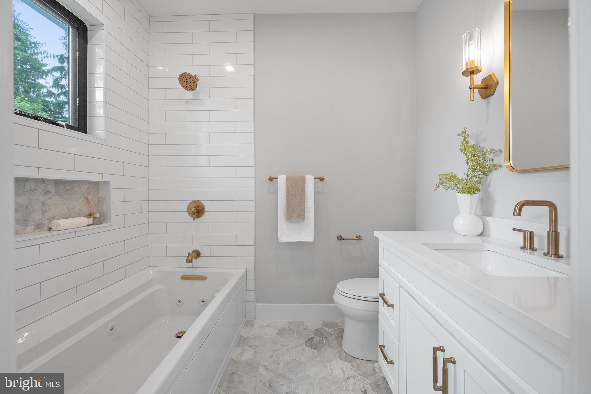 761 Mt Moro Road Villanova, PA 19085 - Photo 75 of 92 a bathroom with a sink a toilet and shower