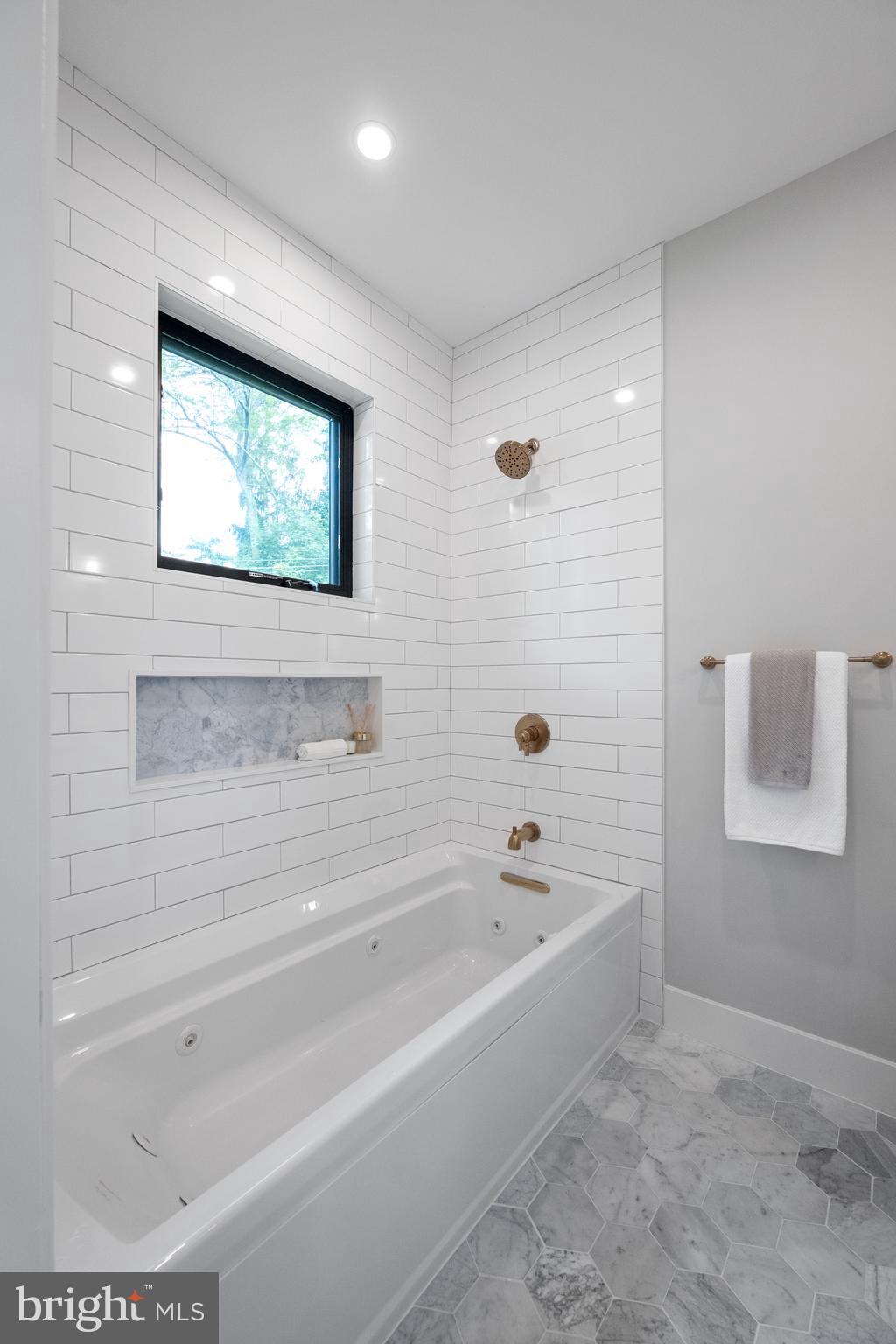 761 Mt Moro Road Villanova, PA 19085 - Photo 76 of 92 a bathroom with a bathtub and shower