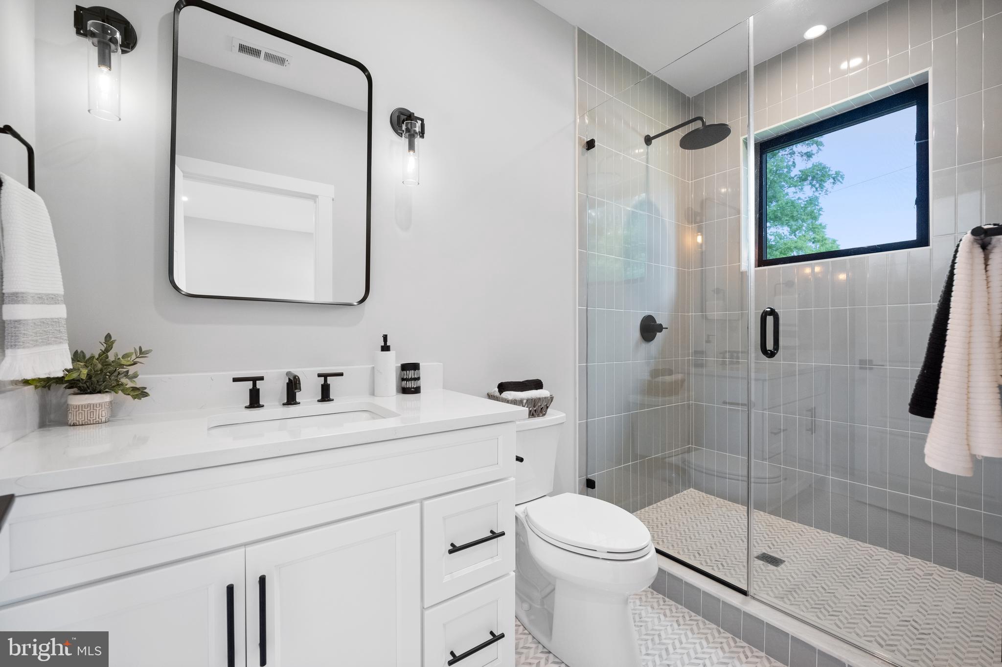 761 Mt Moro Road Villanova, PA 19085 - Photo 79 of 92 a bathroom with a sink a toilet and shower