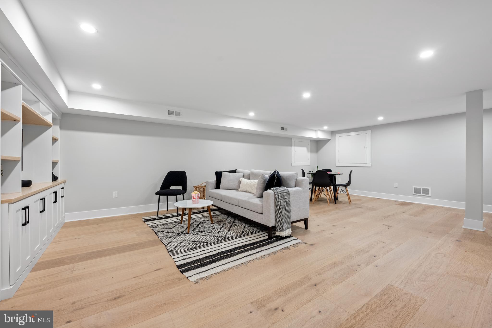 761 Mt Moro Road Villanova, PA 19085 - Photo 90 of 92 a living room with furniture and a flat screen tv