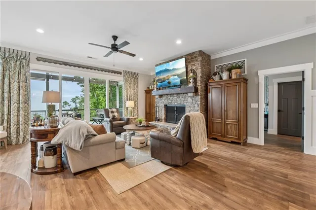 a view of a dining room with furniture and a large window