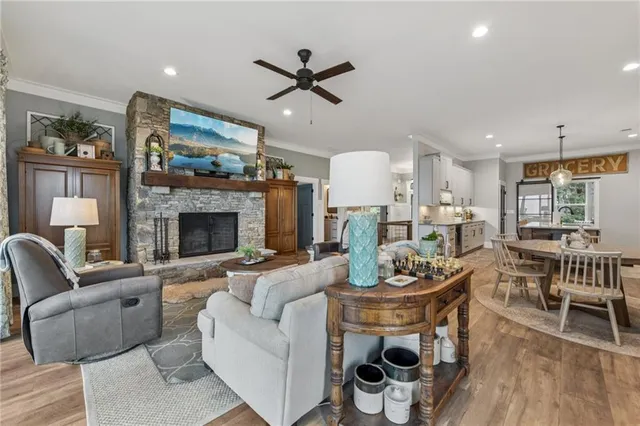 a kitchen with stainless steel appliances granite countertop a stove and a wooden cabinets