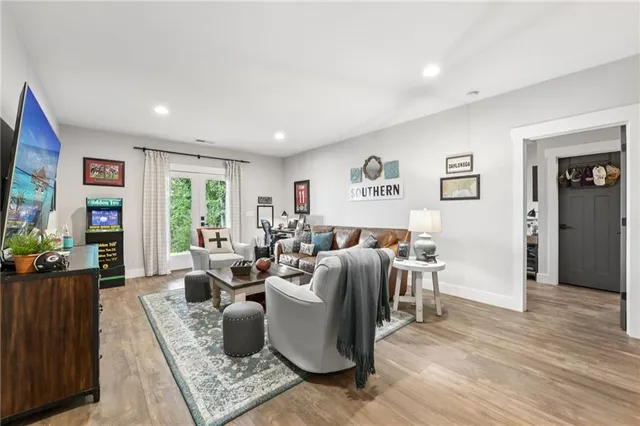 a view of a hallway with a refrigerator and a stove