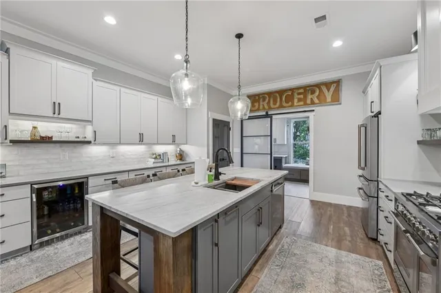 a bedroom with furniture and a wooden floor