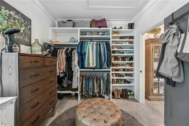 a view of a backyard with sitting area