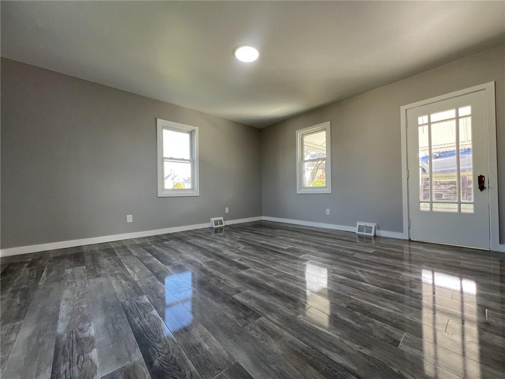 37 Lebanon Avenue Uniontown, PA 15401 - Photo 4 of 15 a view of empty room with window and wooden floor