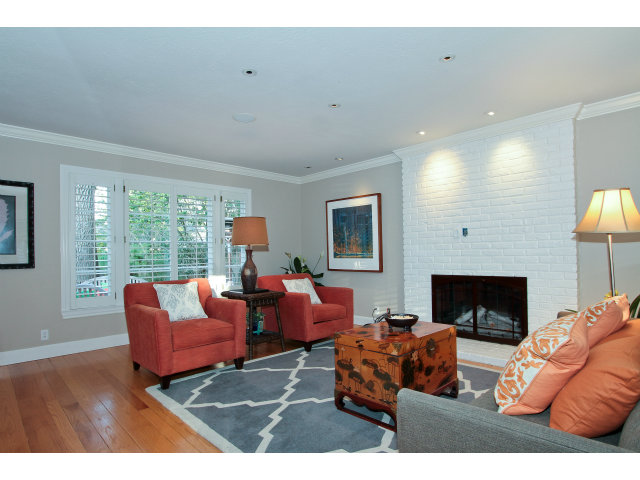 327 Bay Road Menlo Park, CA 94025 - Photo 3 of 19 a living room with furniture fireplace and a large window