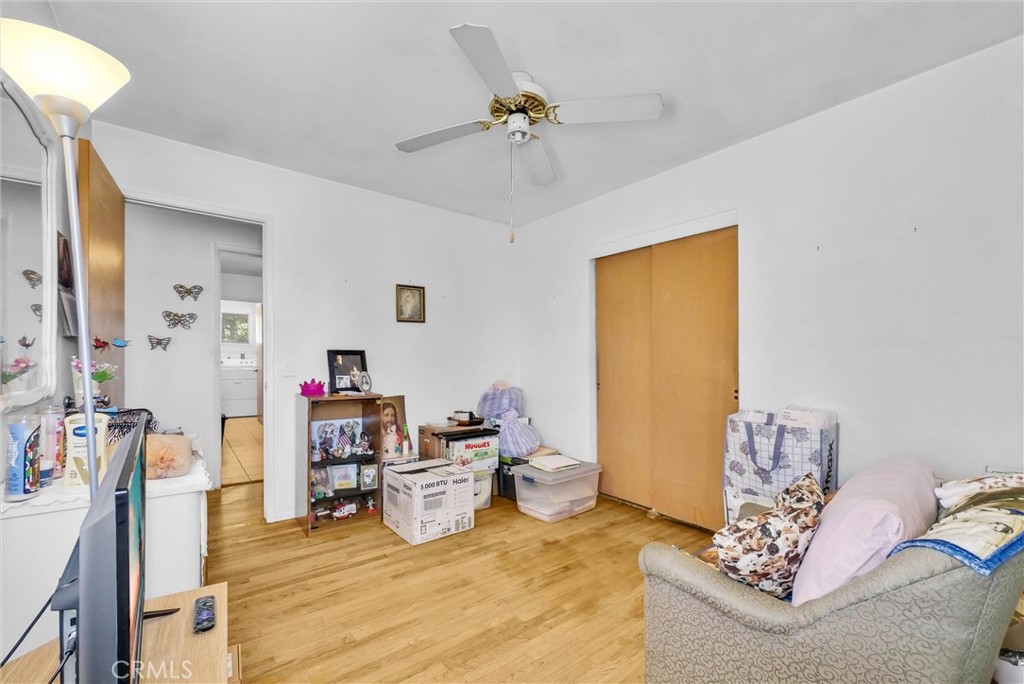 2551 Rome Avenue Anaheim, CA 92804 - Photo 17 of 27 a living room with furniture and a chandelier