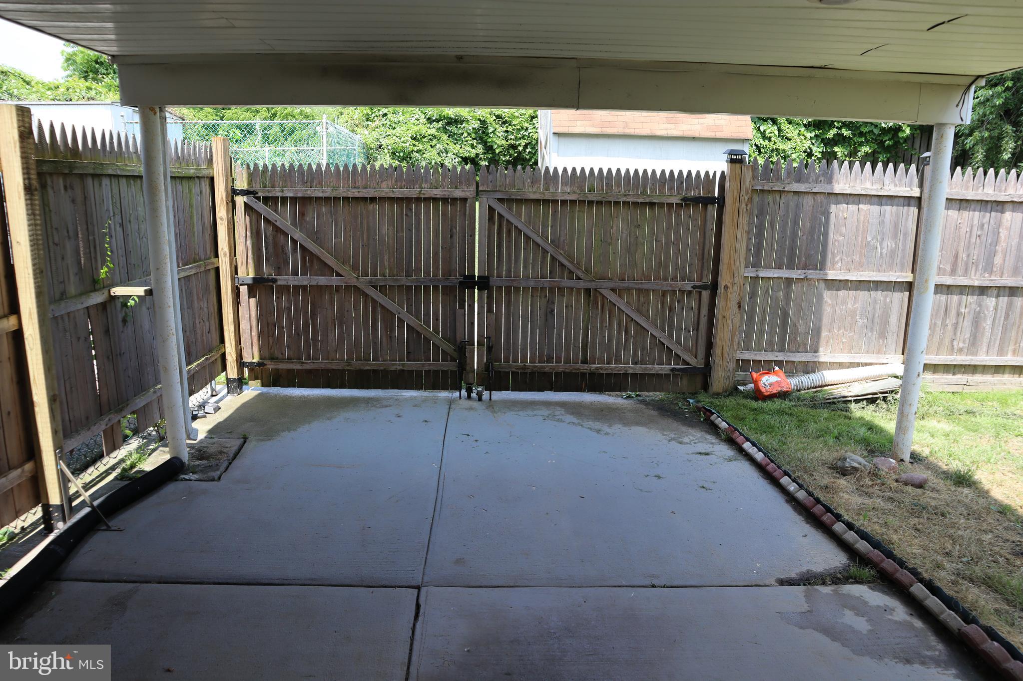 716 Michell Street Ridley Park, PA 19078 - Photo 30 of 38 Secure driveway parking & carport at the rear