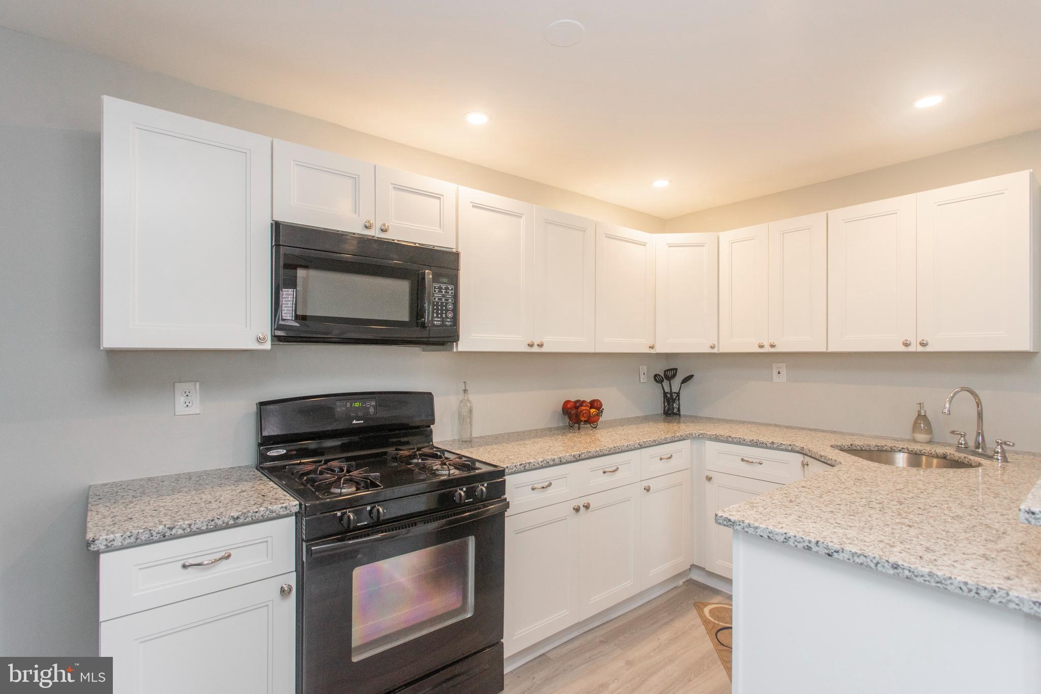 716 Michell Street Ridley Park, PA 19078 - Photo 7 of 38 Granite counters & recessed lighting!