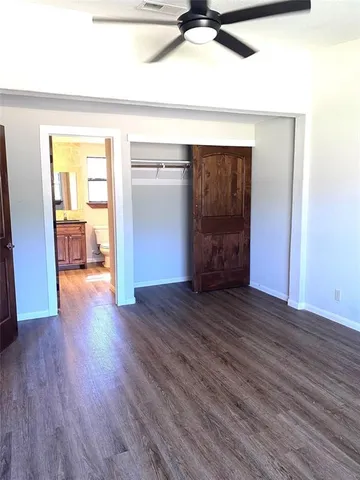 a view of a kitchen from the hallway