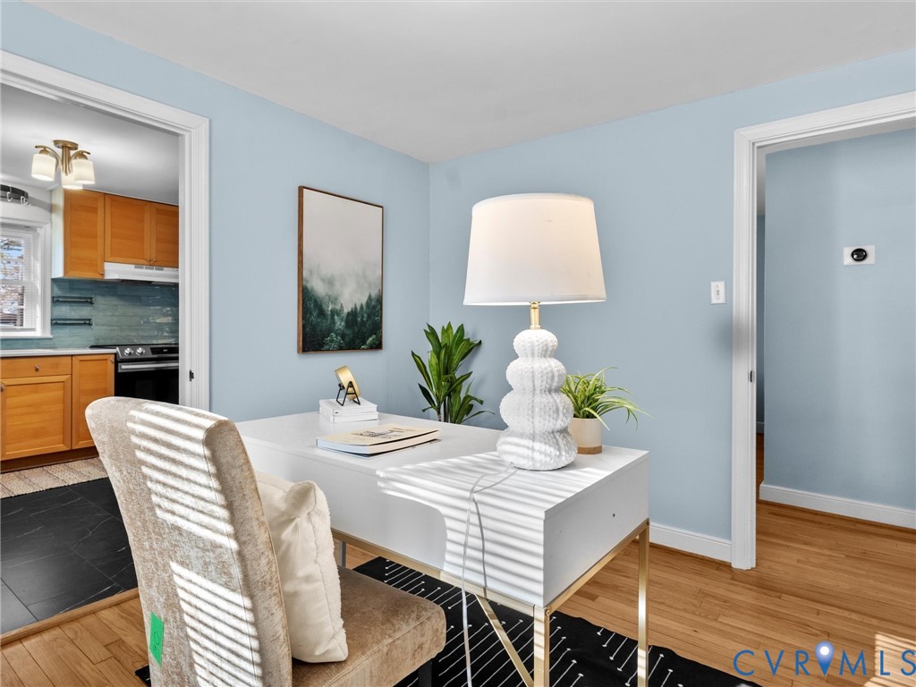 6715 Galaxie Road Henrico, VA 23228 - Photo 22 of 40 a view of a dining room with furniture and wooden floor